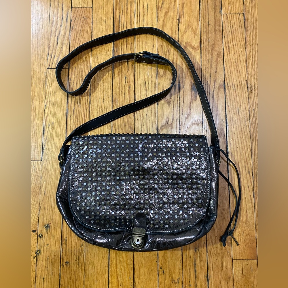 Studded, Patricia Nash crossbody bag with adjustable strap and optimal storage